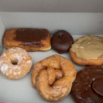 Johan's Pastry Shop - Long John with cream, double chocolate, maple cinnamon roll, sugar, glazed knot, chocolate cinnamon roll. - Bakeries Near Me - Petoskey, Michigan Johan's Pastry Shop - Long John with cream, double chocolate, maple cinnamon roll, sugar, glazed knot, chocolate cinnamon roll. - Bakeries Near Me - Petoskey, Michigan