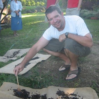 Rancho Aloha - A Rancho Aloha visitor happily roasting his own coffee! - Coffee & Tea Near Me