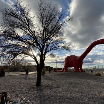 Large Red Dinosaur - Large Red Dinosaur by the self storage - Landmarks & Historical Buildings Near Me - Albuquerque, New Mexico
