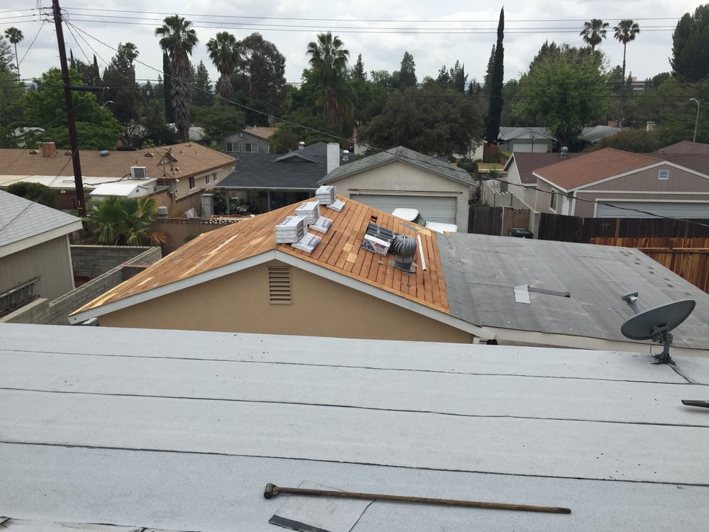 Slide of Elite Roofing