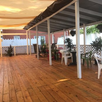 John's Diner - a covered patio with tables and chairs - Coffee & Tea Near Me - Bronx, New York John's Diner - a covered patio with tables and chairs - Coffee & Tea Near Me - Bronx, New York