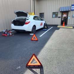 Augusta Defensive Driving School - During Classroom Driver's Education...Changing a tire