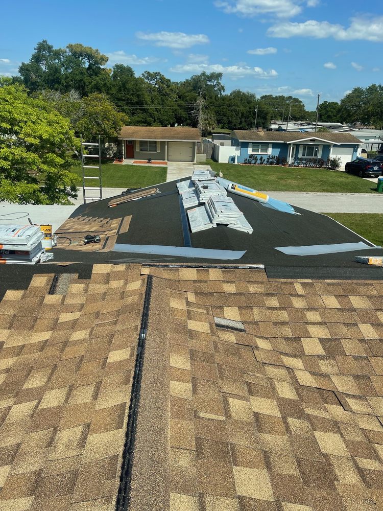 Slide of Arch Roofing & Repair