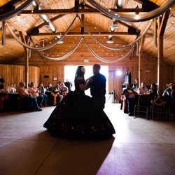 American West Heritage Center - Father and daughter dance inside the building called the Livery.