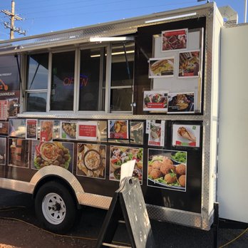 Homemade Mediterranean - a man ordering food from a food truck - Mediterranean Near Me - Somerset, Massachusetts Homemade Mediterranean - a man ordering food from a food truck - Mediterranean Near Me - Somerset, Massachusetts