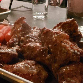 Hops & Scotch - The parmesan garlic chicken wings arrived steaming hot. Yum!! - Whiskey Bars Near Me - Walnut Creek, California Hops & Scotch - The parmesan garlic chicken wings arrived steaming hot. Yum!! - Whiskey Bars Near Me - Walnut Creek, California