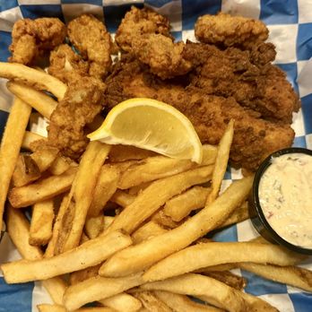 Shuckin' Shack Oyster Bar - Fish and chips and shrimp combo - Sports Bars Near Me - Leland, North Carolina