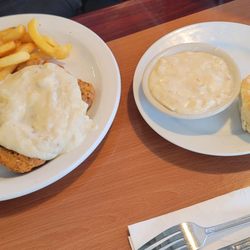 Our Place Restaurant - Country fried steak and fries, with a biscuit