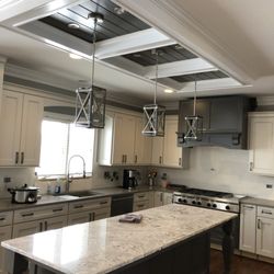 Total Maintenance and Repair - Decorative soffit over island as well as full kitchen cabinet install
