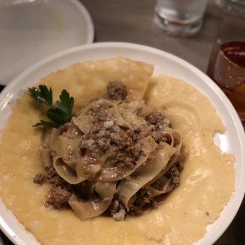 Torchio Pasta Bar - Giovanna Bolognese in a parmesan basket - Italian Near Me - Chicago, Illinois Torchio Pasta Bar - Giovanna Bolognese in a parmesan basket - Italian Near Me - Chicago, Illinois