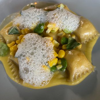 Heritage - Corn agnolotti with Parmesan emulsion - Modern European Near Me - Long Beach, California Heritage - Corn agnolotti with Parmesan emulsion - Modern European Near Me - Long Beach, California