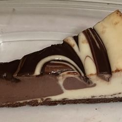Kroger - Private selection chocolate tuxedo cheesecake. It's alright. I won't buy again.
