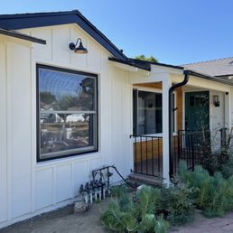 Beautiful paint job, accents, staining on the new wooden wall and fun accent door color! So clean and fresh! Beautiful paint job, accents, staining on the new wooden wall and fun accent door color! So clean and fresh!