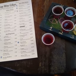 a menu and cups of wine a menu and cups of wine
