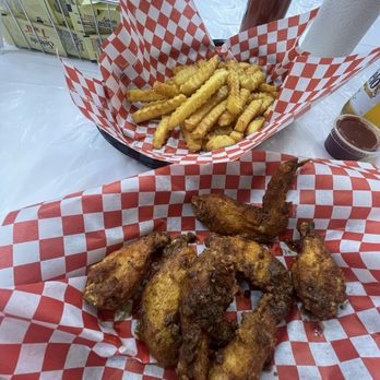 Crimson Crab - Wings tossed is spicy garlic - Seafood Near Me - Houston, Texas Crimson Crab - Wings tossed is spicy garlic - Seafood Near Me - Houston, Texas