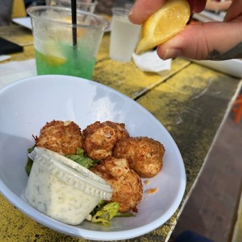 Coco's Crush Bar and Grill OG - Monkey Balls (crab balls) - Tiki Bars Near Me - Clearwater, Florida Coco's Crush Bar and Grill OG - Monkey Balls (crab balls) - Tiki Bars Near Me - Clearwater, Florida