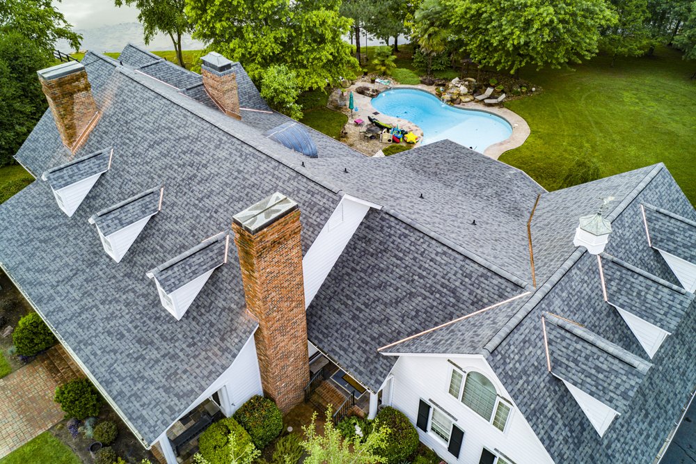 Slide of Guy Roofing