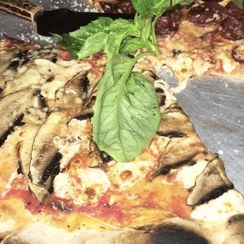 Lucali - Half Portabella Mushroom/Half Pepperoni with Fresh Basil and Garlic - Italian Near Me - Miami Beach, Florida Lucali - Half Portabella Mushroom/Half Pepperoni with Fresh Basil and Garlic - Italian Near Me - Miami Beach, Florida