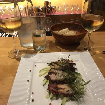 Ideale - The calamari served with 2 Pinot Grigios. - Italian Near Me - San Francisco, California Ideale - The calamari served with 2 Pinot Grigios. - Italian Near Me - San Francisco, California