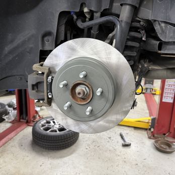Accurate Auto - New rear brake pad and rotor. - Auto Repair Near Me - Des Plaines, Illinois Accurate Auto - New rear brake pad and rotor. - Auto Repair Near Me - Des Plaines, Illinois