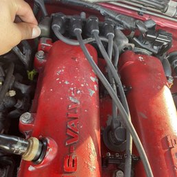 Bolts holding coil pack to valve cover are missing and need replacement. Bolts holding coil pack to valve cover are missing and need replacement.