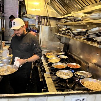 Carmelina's - Perfect spot in front of the chef cooking - Italian Near Me - Boston, Massachusetts Carmelina's - Perfect spot in front of the chef cooking - Italian Near Me - Boston, Massachusetts