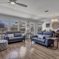 Bouquet Homes Assisted Living & Memory Care - The Primrose - The Family Room - Residents gather to relax and socialize in this sun-drenched room.