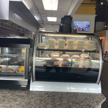 Rico Tropical Grill - Dessert and Beef Empanada Display Cases - Caribbean Near Me - Kennesaw, Georgia