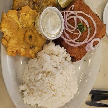 Polo Norte - Coral Way - Uruguayo de Cerdo (breaded pork steak with Swiss cheese bacon & chorizo) w/Fried plantains amd white rice - Cuban Near Me - Miami, Florida Polo Norte - Coral Way - Uruguayo de Cerdo (breaded pork steak with Swiss cheese bacon & chorizo) w/Fried plantains amd white rice - Cuban Near Me - Miami, Florida