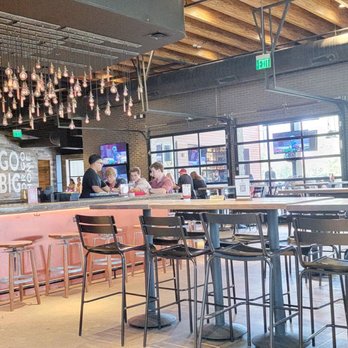 Happiest Hour - Outdoor seating at well - Cocktail Bars Near Me - Dallas, Texas