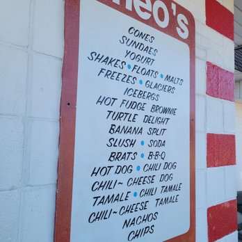 Theo's - a menu on the side of a building - Ice Cream & Frozen Yogurt Near Me - Peoria, Illinois