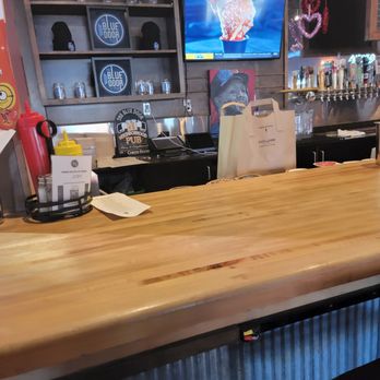 Blue Door Pub Como Ave - bar counter and television - Burgers Near Me - Minneapolis, Minnesota