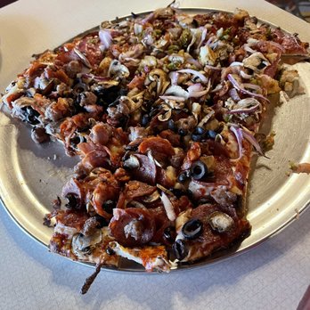 Wild River Pizza - Two different combinations.  One was called Sinkhole and the other side was a meat lovers combo that I don't remember the name of - Pizza Near Me - Brookings Harbor, Oregon