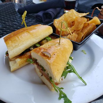 Wild River Grille - Brie and pear with prosciutto. Home made chips - New American Near Me - Reno, Nevada Wild River Grille - Brie and pear with prosciutto. Home made chips - New American Near Me - Reno, Nevada