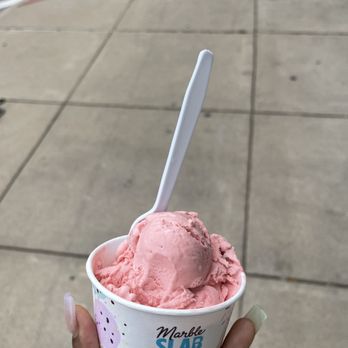 Marble Slab Creamery - a hand holding a cup of ice cream - Ice Cream & Frozen Yogurt Near Me - Fort Worth, Texas Marble Slab Creamery - a hand holding a cup of ice cream - Ice Cream & Frozen Yogurt Near Me - Fort Worth, Texas