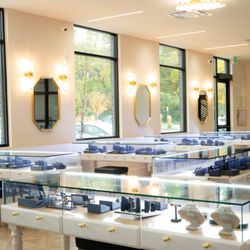 Inside the Wilson Diamonds showroom, featuring mirrors and rows of jewelry cases