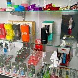 Golden Leaf Smoke Shop - Grinders and Vape Pen Batteries display at Golden Leaf Shop in Mission