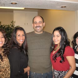 John Cesario, DDS - Redlands Family Dental - Dr. Cesario with his wife and office team.