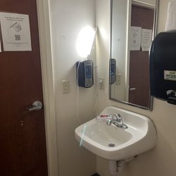 Lakewood Family Dental - The same little fluorescent light dangling from this nasty bathroom.