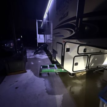 Rhino Brothers General Contracting - Front of RV blown off the blocks.The RV fell and went all the way down to the bottom of the jacks. Door was bad off center. - Handyman Near Me Rhino Brothers General Contracting - Front of RV blown off the blocks.The RV fell and went all the way down to the bottom of the jacks. Door was bad off center. - Handyman Near Me