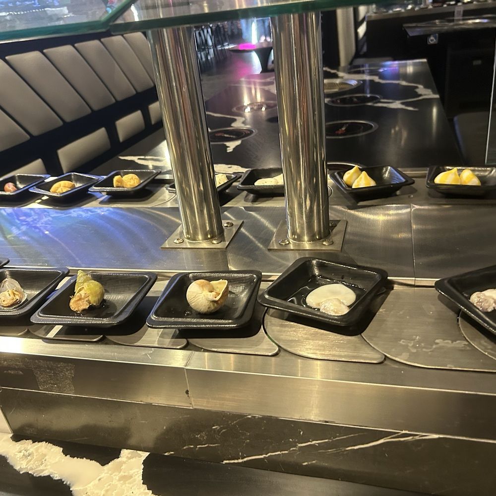 Seapot - Conveyor belt with seafood - Asian Fusion Near Me - Sacramento, California Seapot - Conveyor belt with seafood - Asian Fusion Near Me - Sacramento, California