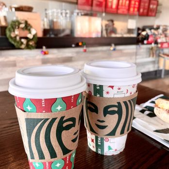 Starbucks - Holiday cups of yummy hot lattes. HIGHLY RECOMMEND THE SUGAR COOKIE ALMONDMILK LATTE - get it hot!!! - Coffee & Tea Near Me - Roanoke, Virginia