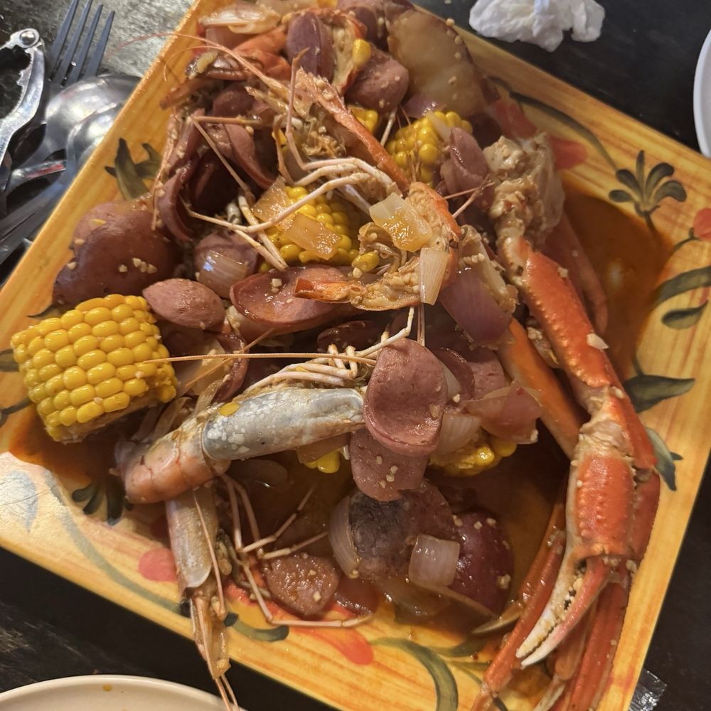 Seafood boil with crab, prongs, and sausage! Seafood boil with crab, prongs, and sausage!
