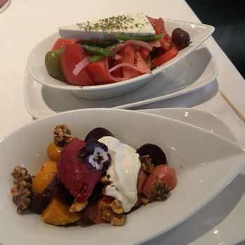 Kyma - Greek tomato and cucumber salad and a four beet with cold beet sorbet salad. - Greek Near Me - Atlanta, Georgia