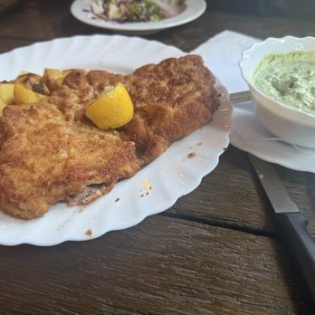 Apfelwein Wagner - Schnitzel with potatoes and green sauce. - German Near Me - Frankfurt, HE