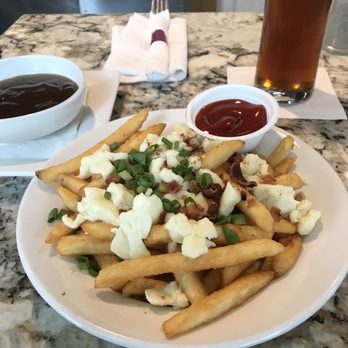 Canucks Bar & Grill YVR - Poutine and beer - Pubs Near Me - Richmond, British Columbia Canucks Bar & Grill YVR - Poutine and beer - Pubs Near Me - Richmond, British Columbia