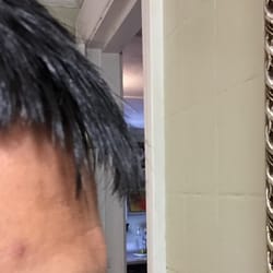 Zone Barber Shop - Most uneven haircut I've ever gotten