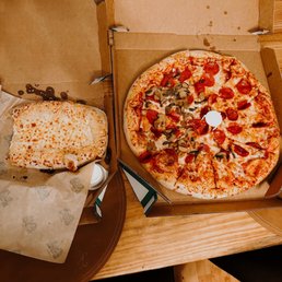 Warm Cheesy bread with ranch and marinara dressing on the side. Large pizza (12 slices) full pepperoni half mushroom. Warm Cheesy bread with ranch and marinara dressing on the side. Large pizza (12 slices) full pepperoni half mushroom.