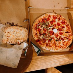 Marco's Pizza - Warm Cheesy bread with ranch and marinara dressing on the side. Large pizza (12 slices) full pepperoni half mushroom.