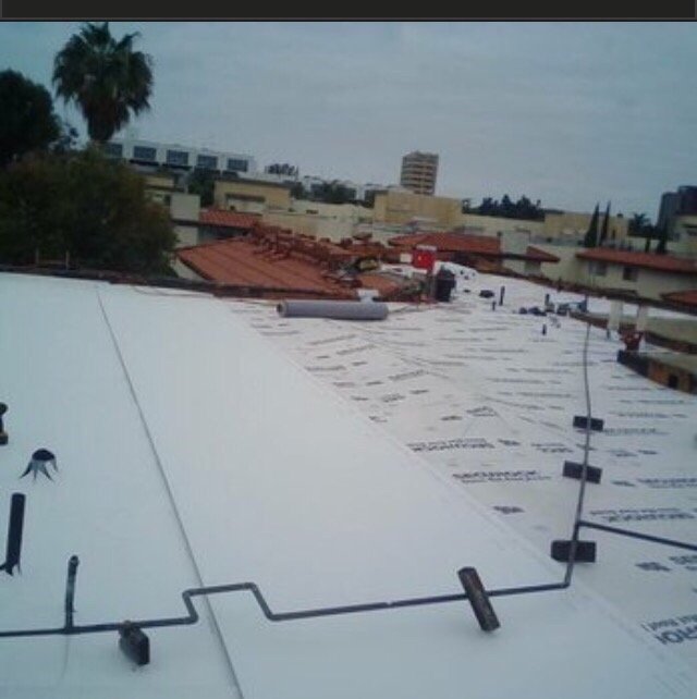 Slide of Tony and Velasco Roofing Constructions